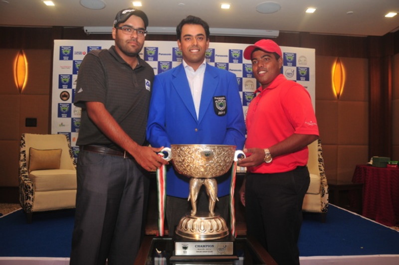 Manav Jaini and Anirban Lahiri of India along Sri Lanka's Mithun Perera pose with the trophy