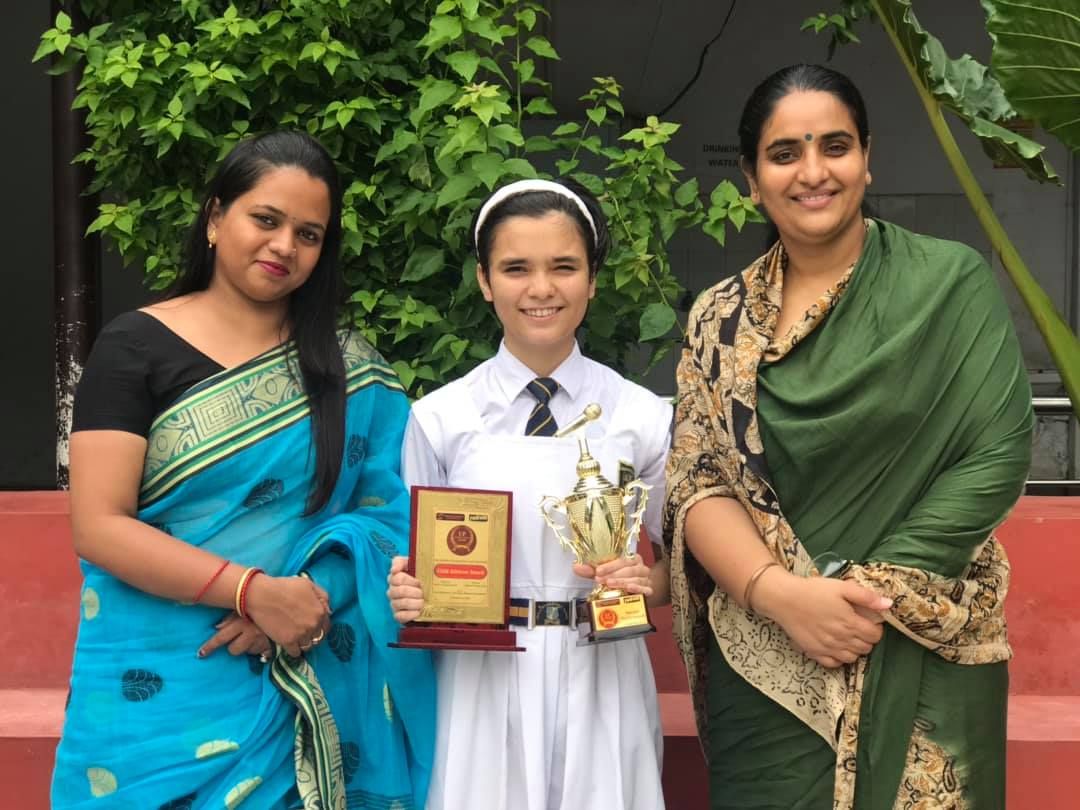 Meethika Dwivedi with her school principal