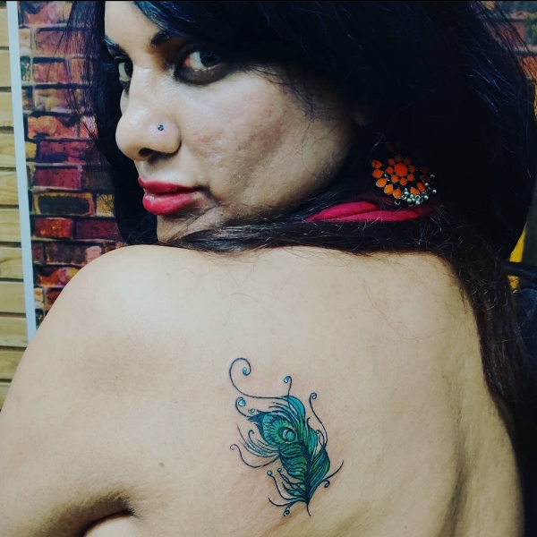 Naaz Joshi`s peacock tattoo