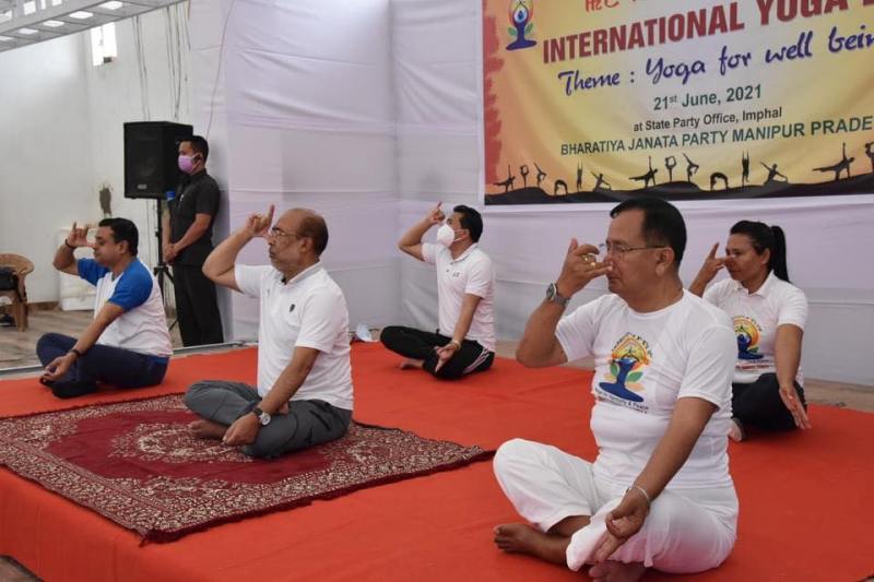 Rajkumar Ranjan Singh while doing Yoga (extreme right)