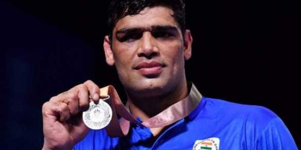 Satish Kumar with a silver medal at the 2018 Commonwealth Games