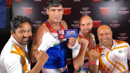 Satish Kumar with the ticket to 2020 Tokyo Olympics