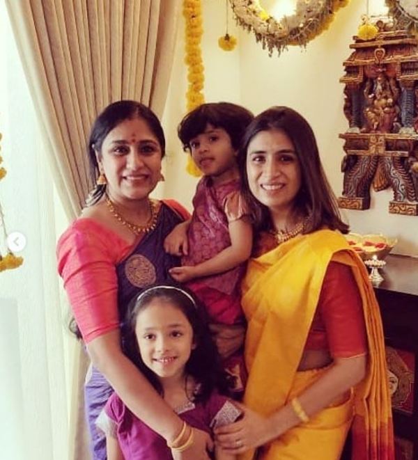 Uma Padmanabhan with her daughter, Sharanya, and grandchildren