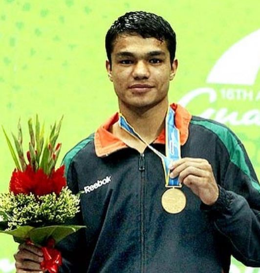Vikas Krishan Yadav with a gold medal