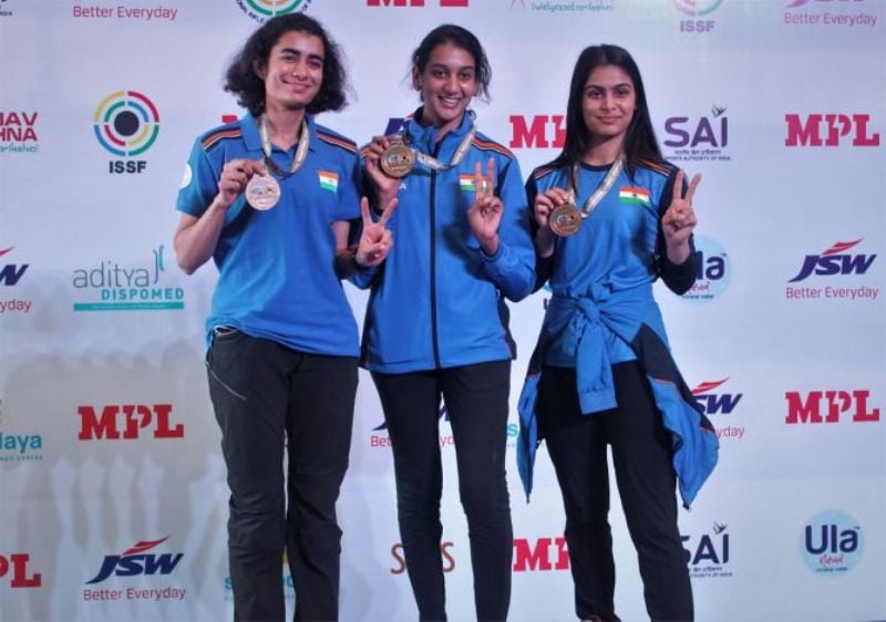 Yashaswini Singh Deswal, Shri Nivetha and Manu Bhaker while winning the gold medal in the women's team 10m air pistol event at the World Cup Rifle Shotgun