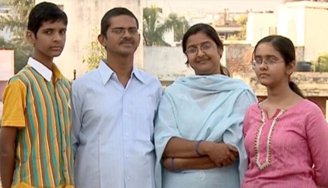 Amitabh Thakur with his wife and children