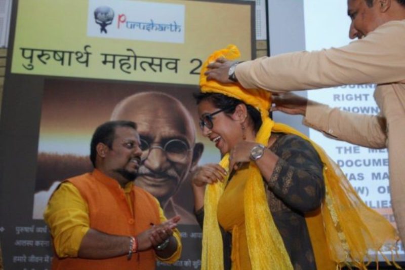 Deepika Bhardwaj while receiving Purusharth award