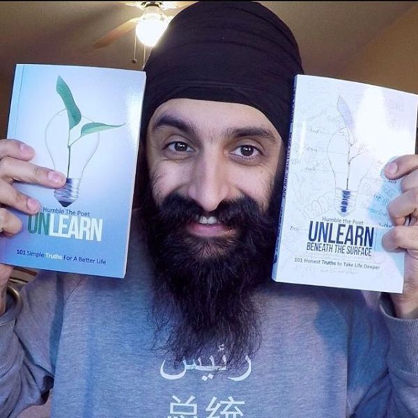 Humble The Poet with his two books of UNLEARN series
