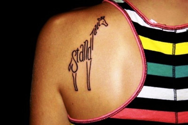 Humble the Poet's 'stand tall' tattoo