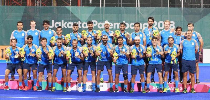 India's men's hockey team posing for a picture after winning bronze at the 2018 Asian Games