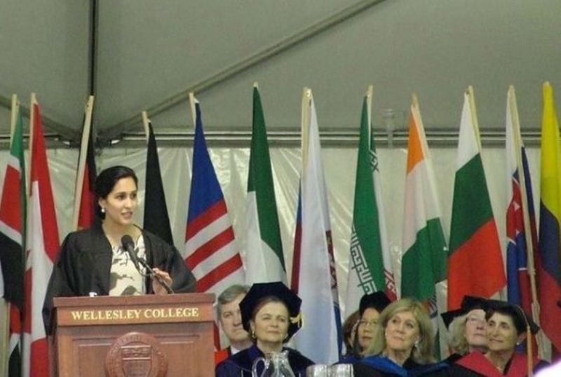 Mira Sethi delivering a speech in her university