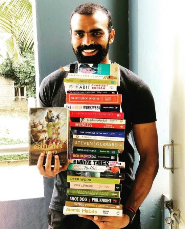 P. R. Sreejesh showing his books collection