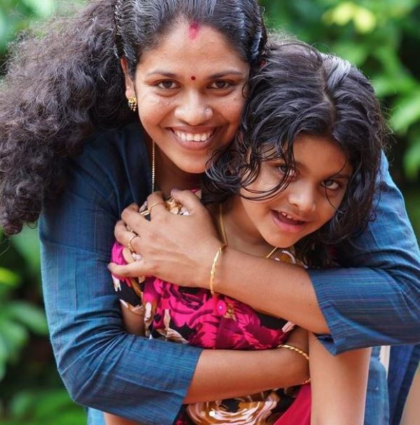 P. R. Sreejesh's wife with his daughter