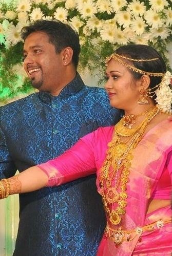 Saranya Sasi and Binu Xavier on their reception day
