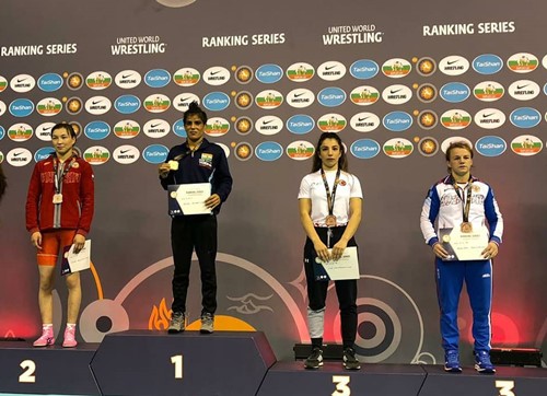 Seema Bisla (second from left) on the podium with the gold medal in Turkey