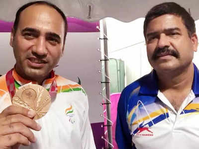 Singhraj Adhana with his coach