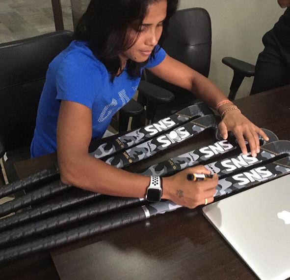 Vandana Katariya signing SNS ProTour Hockey sticks for her fans