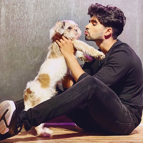 Zeeshan Khan with a dog