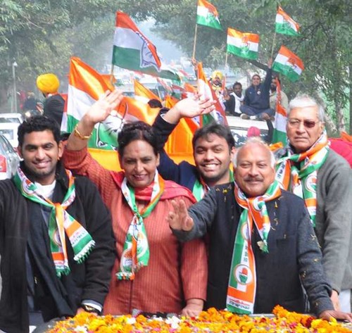Brahm Mohindra (right) with his wife and sons during an election rally
