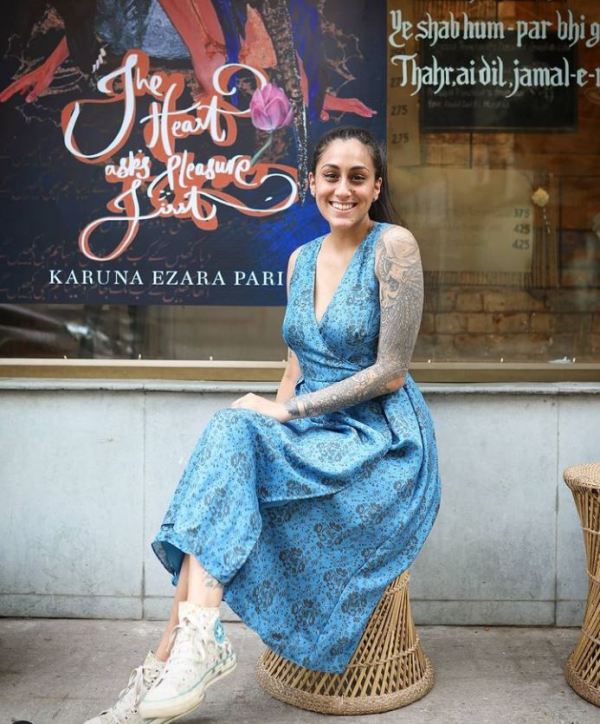 Karuna Ezara Parikh featuring her full arm tattoo