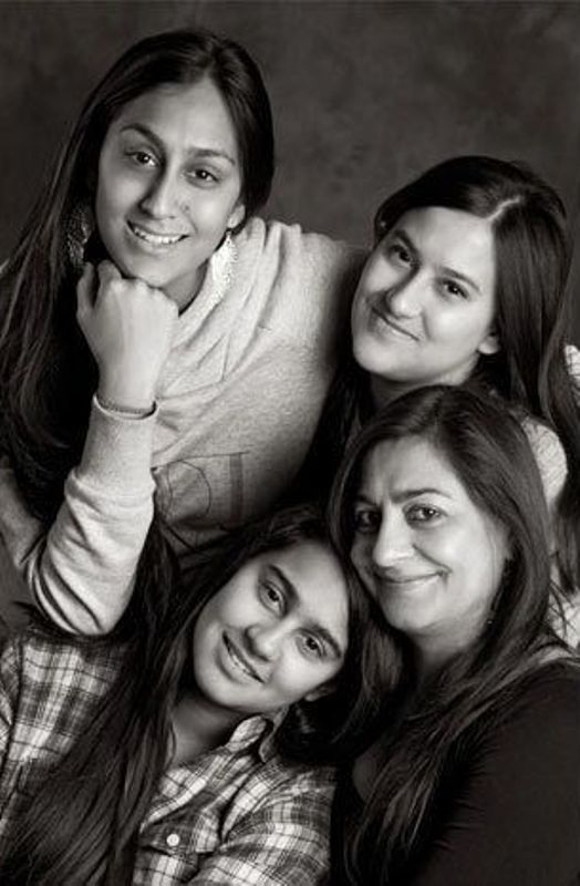 Karuna Ezara Parikh with her mother and two sisters