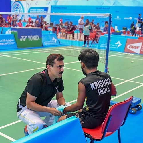 Krishna Nagar with his coach, Gaurav Khanna during a match