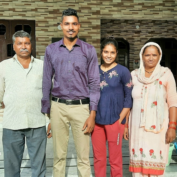 Nishad Kumar with his parents and sister