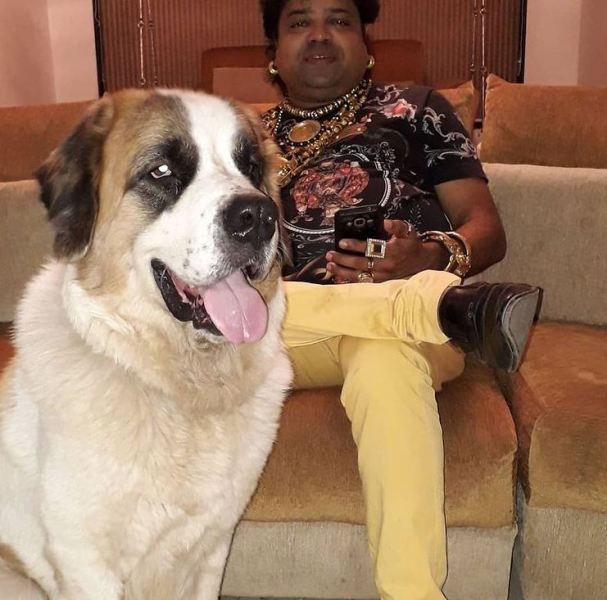 Santosh Chaudhary (Dadus) with his pet dog