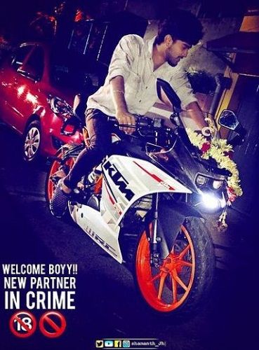 Shamanth Gowda posing on his KTM motorcycle