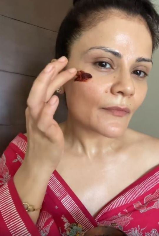 Vasudha Rai while applying a beauty mask on her face
