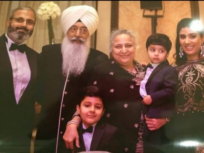 Gurinder Singh Dhillon with his wife, son, daughter-in-law and grandchildren