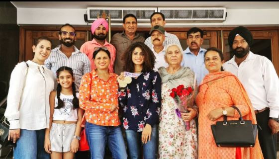 Harmilan Kaur with her family