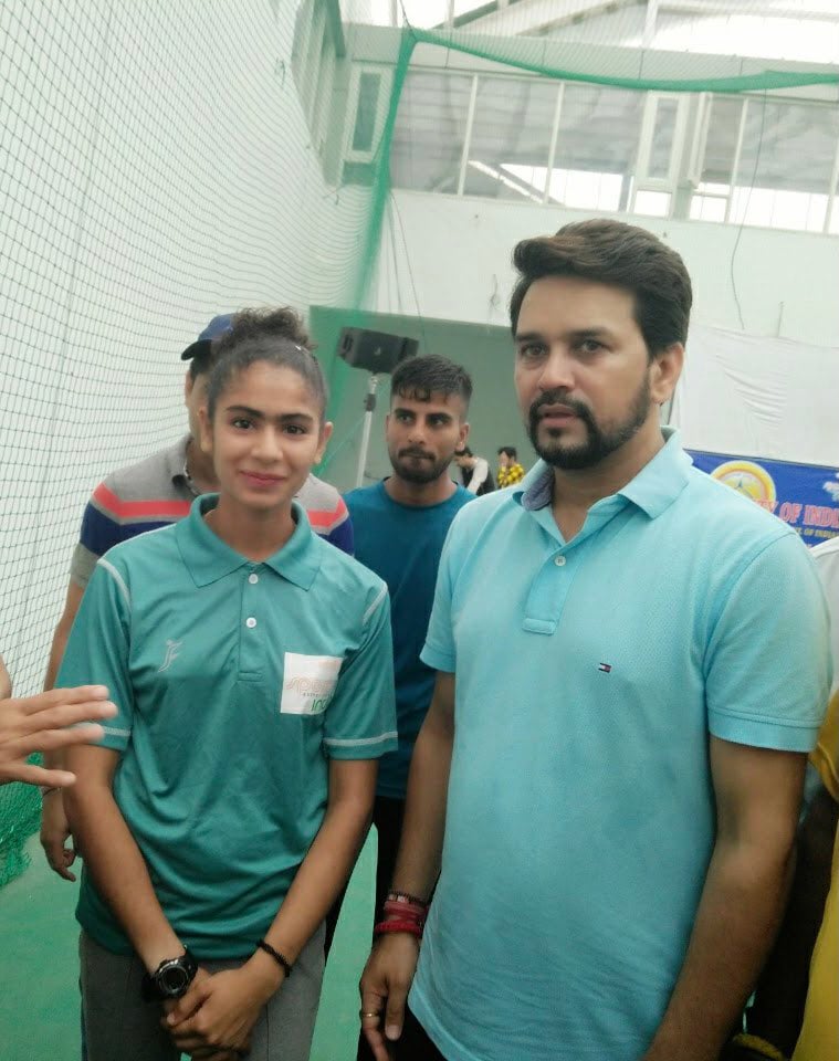 Harmilan Kaur with the Minister of youth affairs and sports Anuraj Thakur