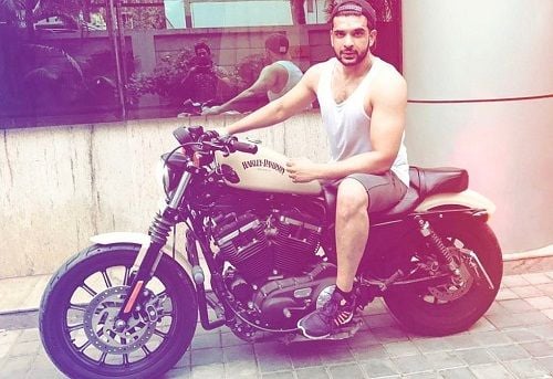 Karan Kundrra sitting on his motorcycle