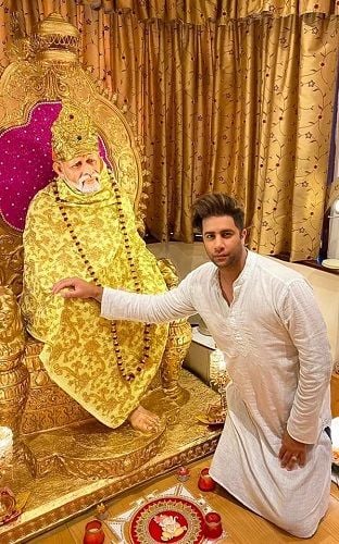 Rajiv Adatia with an idol of Sai Ram