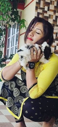 Soujanya with her pet dog Ladoo