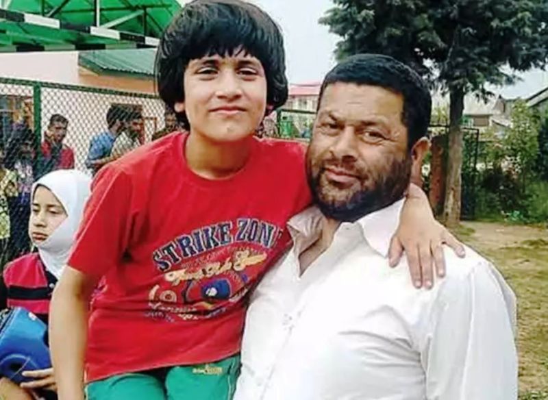 Young Tajamul Islam with her father