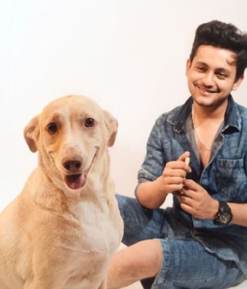 Adish with his dog