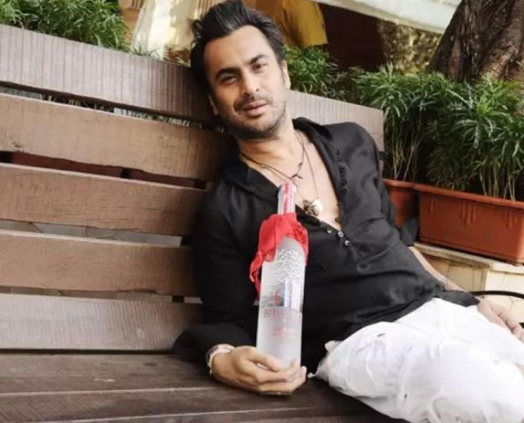 Aki Narula with Belvedere special edition bottle