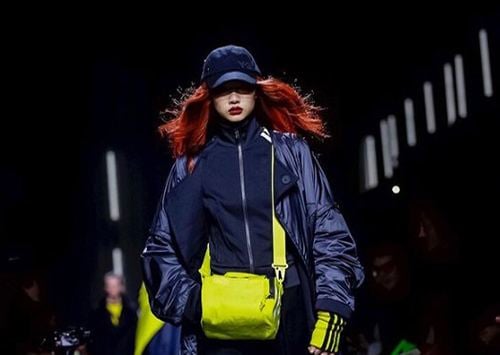 Jung Ho-yeon walking the runway for Adidas in her fiery red hair color