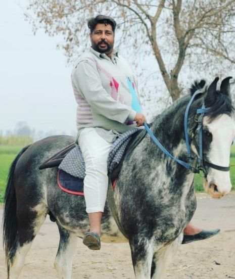 Kaka riding a horse