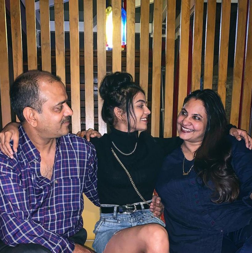 Purabi Bhargava and her parents