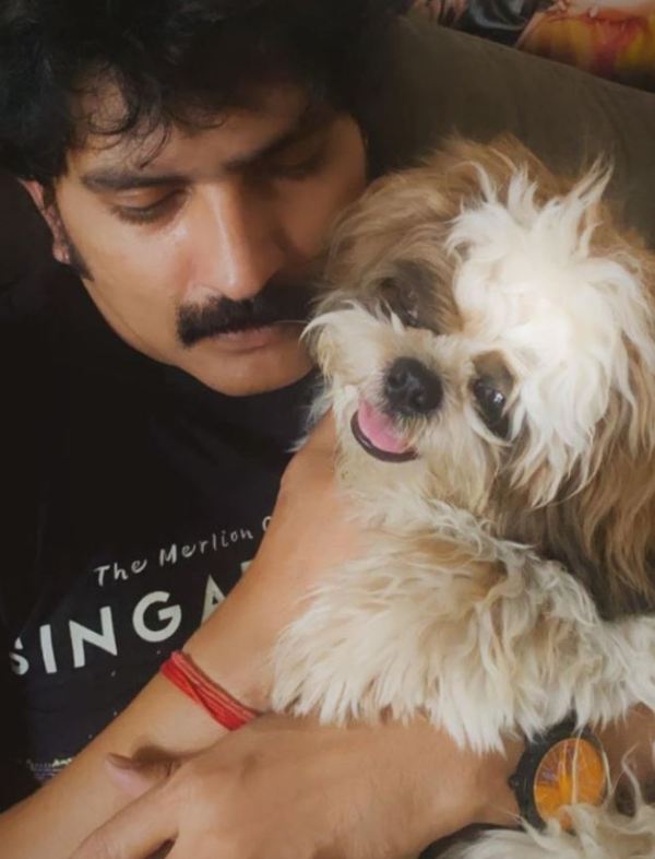 Ravi Kiran with his pet dog