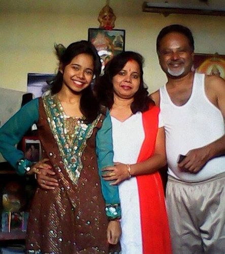 Roza Rana with her parents