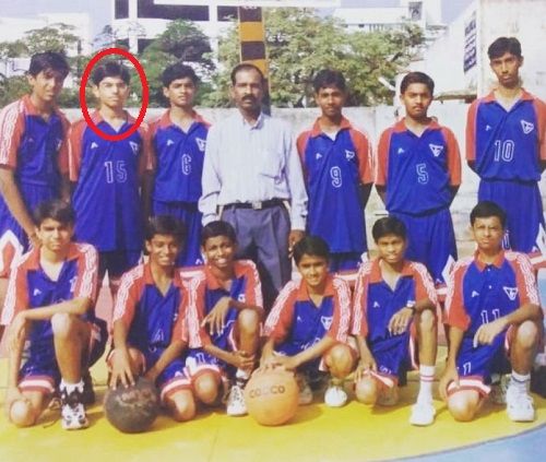 Sreerama Chandra with his school's basketball team