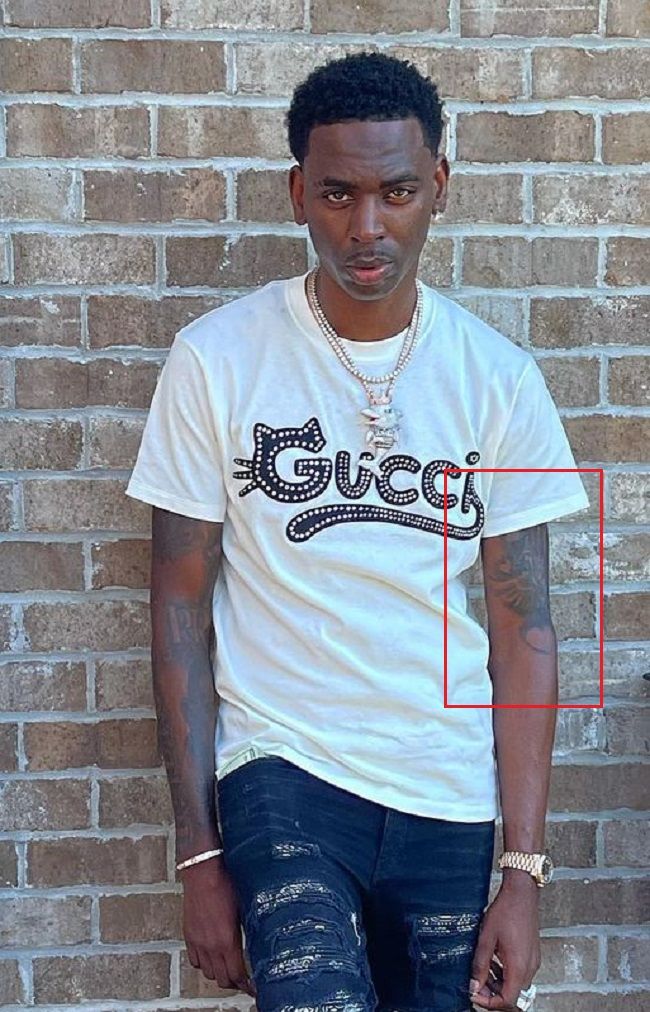Young Dolph's tattoo on his left arm