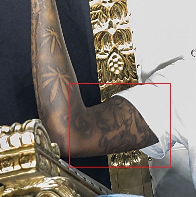 Young Dolph's tattoo on right arm