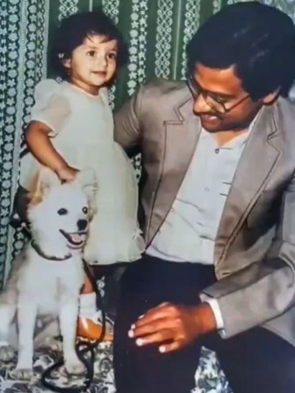 A childhood picture of Hamsa with her father