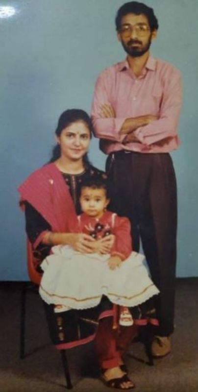 Kavya Ajit's childhood photo with her parents