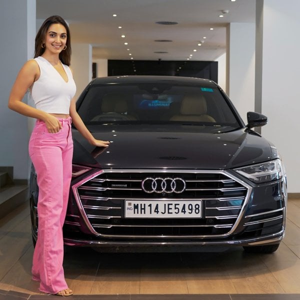 Kiara Advani posing with her brand new car, Audi A8 L